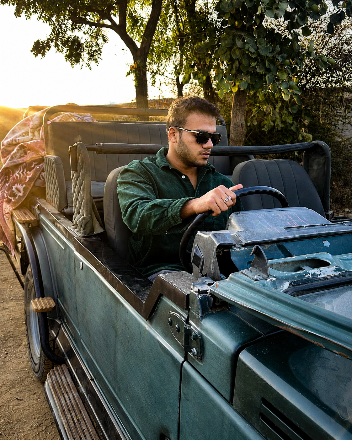 Aman Mohammad, Founder of Safari Rajasthan, in a safari vehicle in Rajasthan