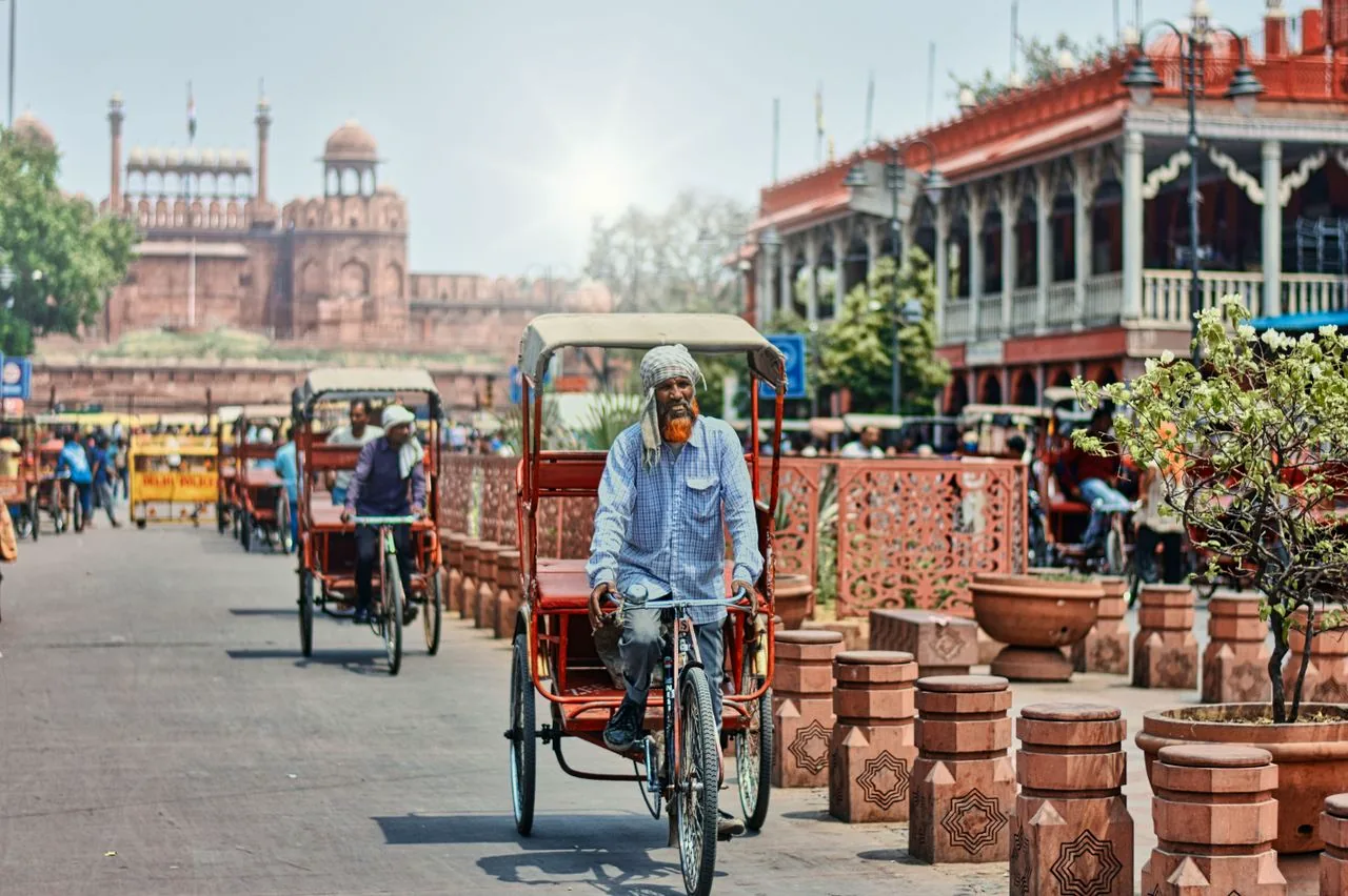 Cycle rickshaw and market street in Chandni Chowk, Old Delhi