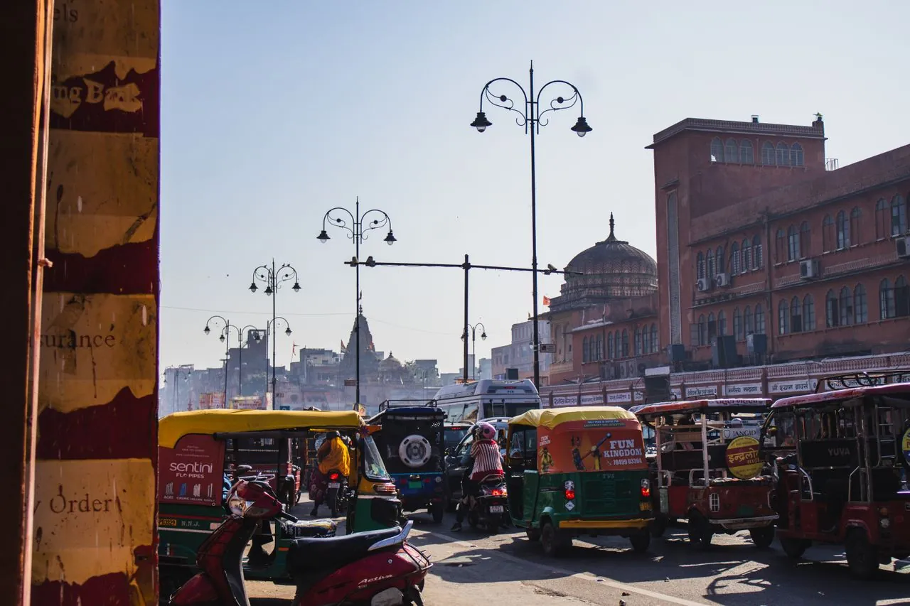 Auto-rickshaws travelling through Jaipur's historic Pink City