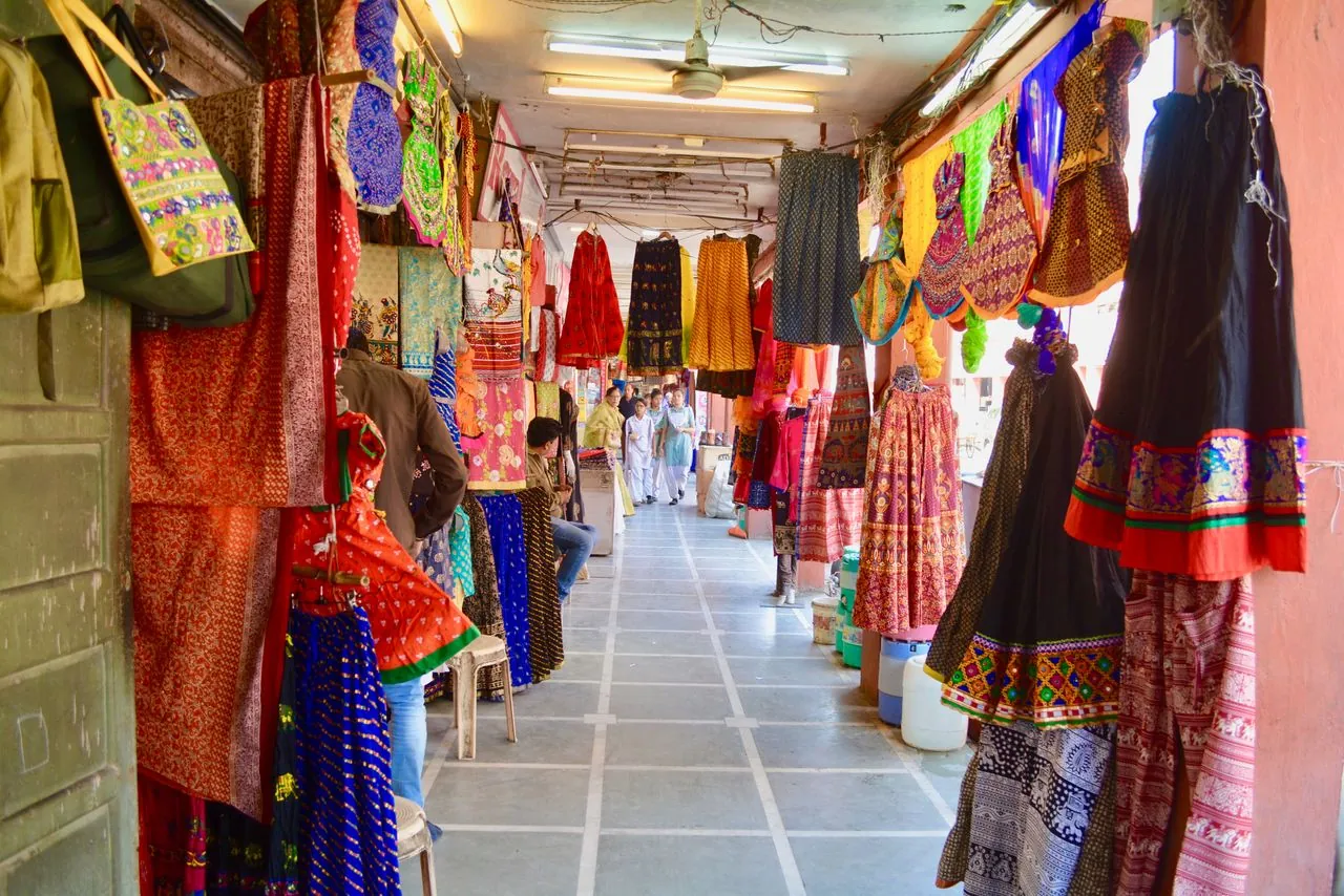 Colourful textiles and traditional garments in Jaipur bazaar